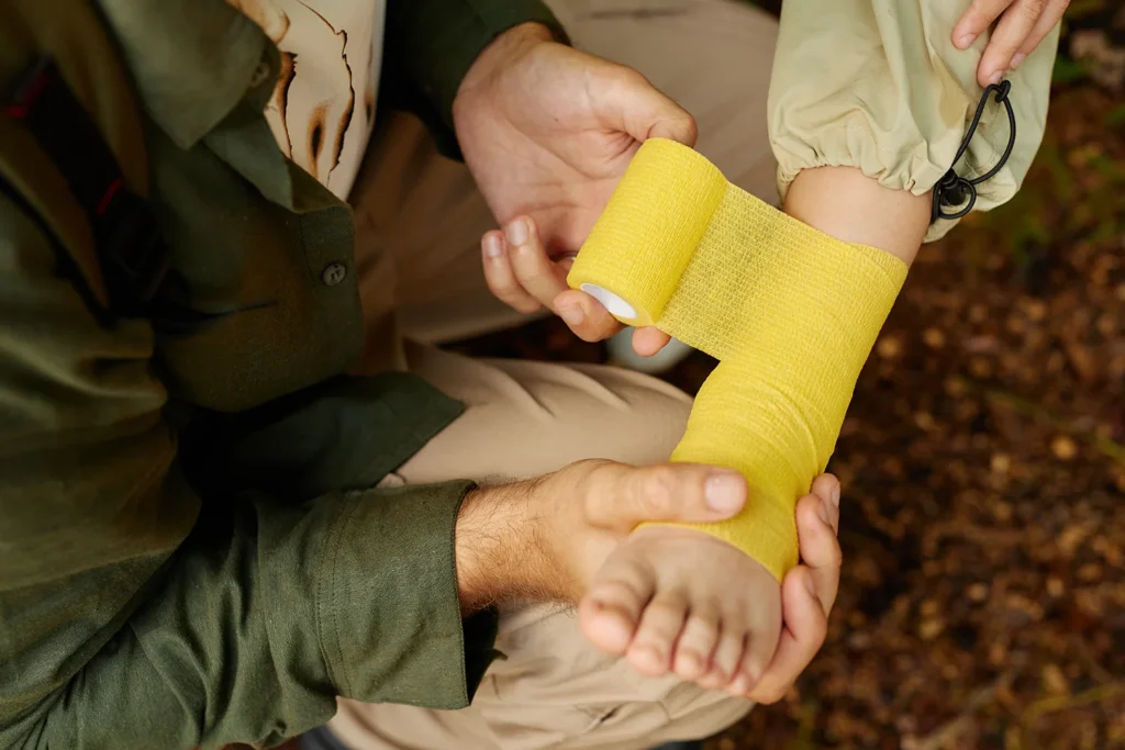 child s ankle being wrappe